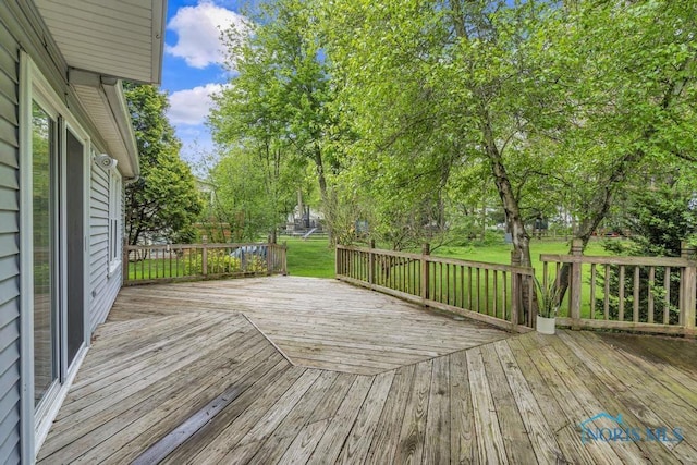 3739 Wild Pheasant Ln, Sylvania, OH 43560 - wooden deck with a lawn