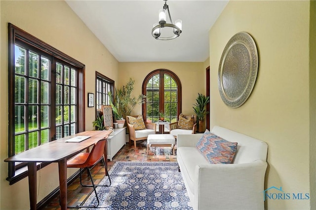 3405 Chestnut Hill Rd, Ottawa Hills, OH 43606 - sitting room with a chandelier and brick patterned floors