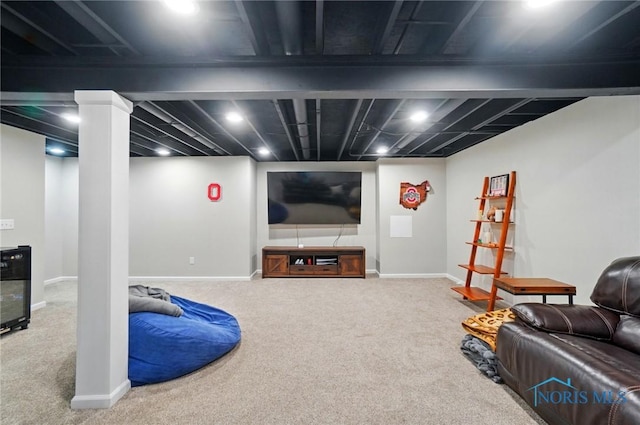 carpeted living room featuring baseboards
