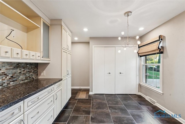 5258 Coldstream Rd, Toledo, OH 43623 - kitchen featuring decorative backsplash, a chandelier, baseboards, recessed lighting, and hanging light fixtures
