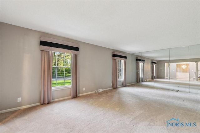 5258 Coldstream Rd, Toledo, OH 43623 - unfurnished living room with carpet and baseboards