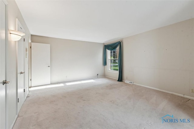 5258 Coldstream Rd, Toledo, OH 43623 - spare room with light colored carpet and baseboards
