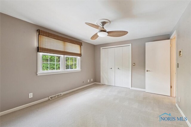 5258 Coldstream Rd, Toledo, OH 43623 - unfurnished bedroom with light carpet, a closet, and baseboards