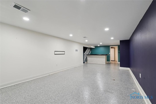 5258 Coldstream Rd, Toledo, OH 43623 - spare room with recessed lighting, baseboards, and dark aggregate flooring