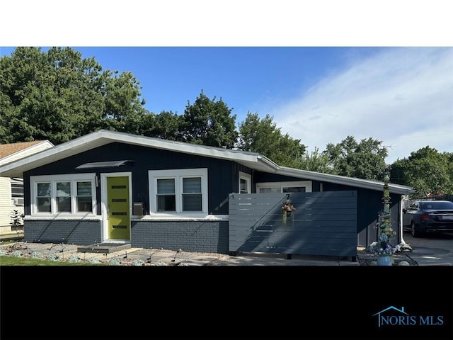 manufactured / mobile home with brick siding and entry steps