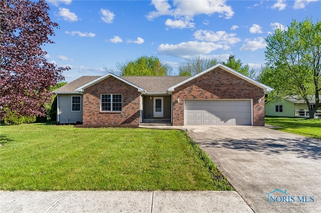 ranch-style home featuring brick siding, a garage, a front yard, and concrete driveway