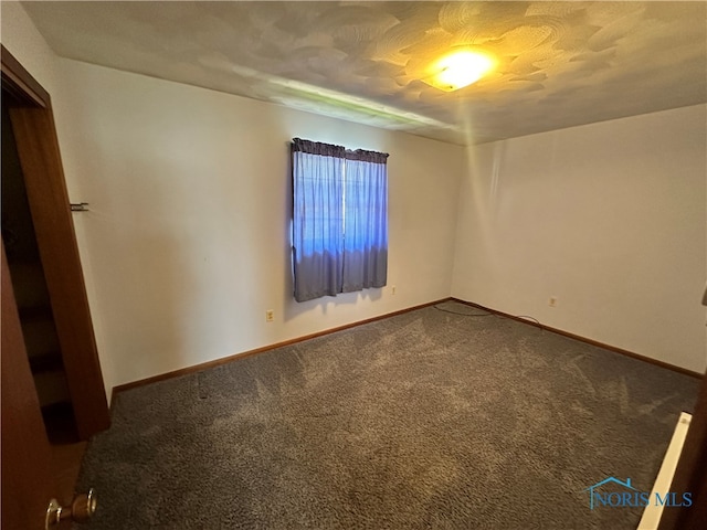 716 N Union St Unit B, Fostoria, OH 44830 - unfurnished room featuring baseboards and carpet