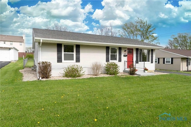 single story home with a front yard
