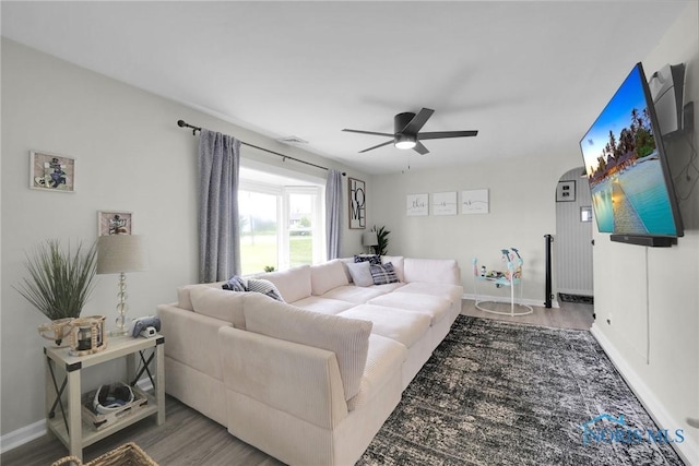 26237 Luckey Rd, Walbridge, OH 43465 - living room featuring wood finished floors, baseboards, and ceiling fan