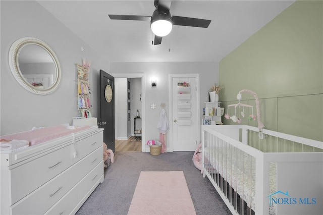 26237 Luckey Rd, Walbridge, OH 43465 - carpeted bedroom with a crib and ceiling fan