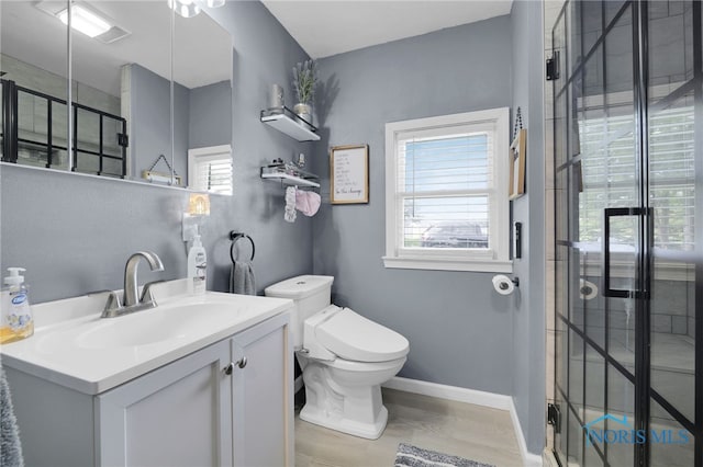 26237 Luckey Rd, Walbridge, OH 43465 - bathroom with toilet, tiled shower, vanity, and baseboards
