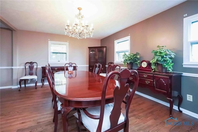 1440 N State Route 19, Republic, OH 44867 - dining space featuring an inviting chandelier, baseboards, and wood finished floors