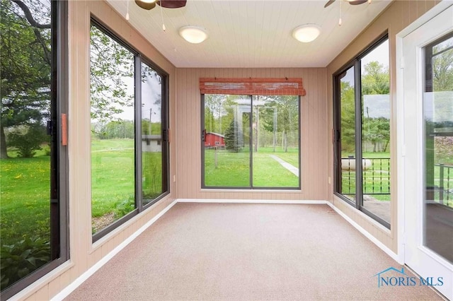 1440 N State Route 19, Republic, OH 44867 - unfurnished sunroom with carpet flooring and a healthy amount of sunlight