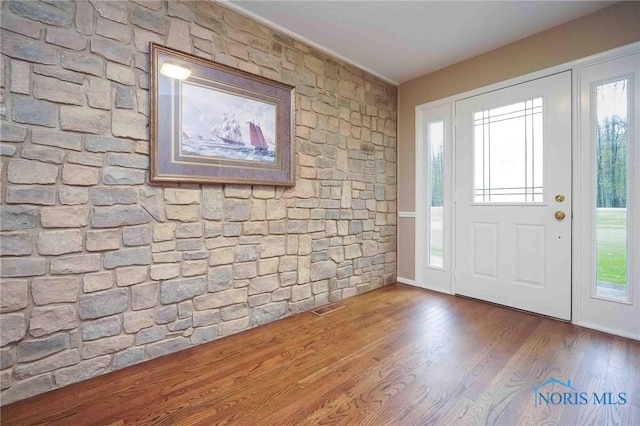 1440 N State Route 19, Republic, OH 44867 - entryway featuring visible vents, baseboards, wood finished floors, and a wealth of natural light
