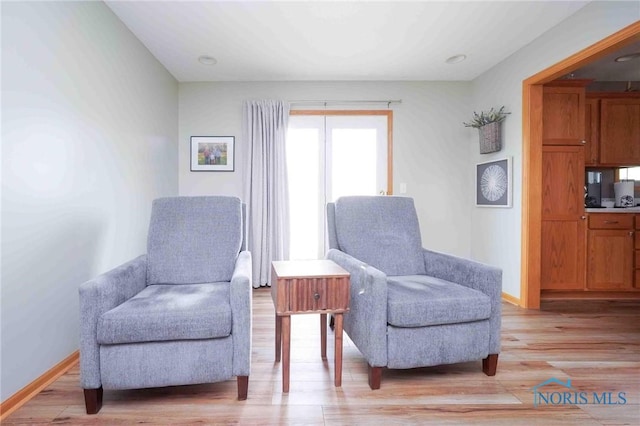 2028 Lakeland Dr, Findlay, OH 45840 - living area with light wood-style floors and baseboards
