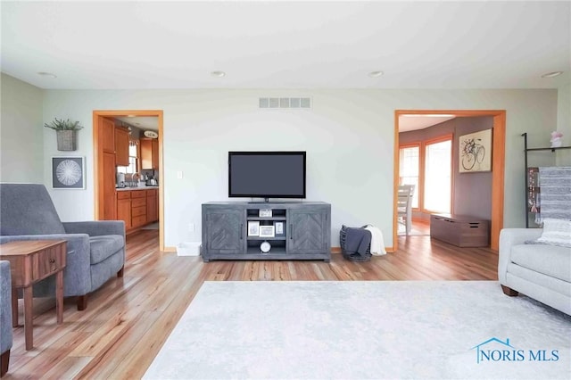 2028 Lakeland Dr, Findlay, OH 45840 - living room featuring visible vents and wood finished floors