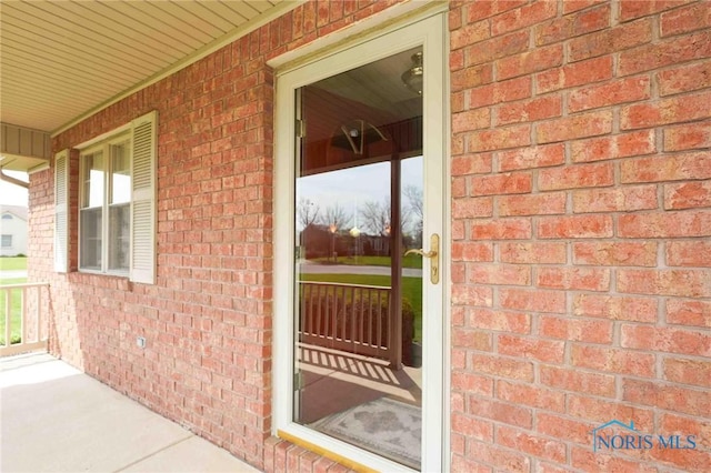 2028 Lakeland Dr, Findlay, OH 45840 - doorway to property featuring brick siding