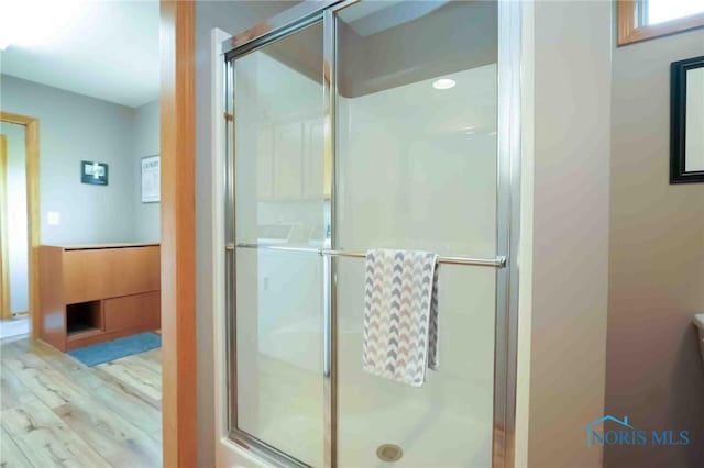 2028 Lakeland Dr, Findlay, OH 45840 - full bath with wood finished floors and a stall shower