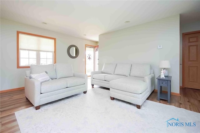 2028 Lakeland Dr, Findlay, OH 45840 - living room with baseboards and wood finished floors