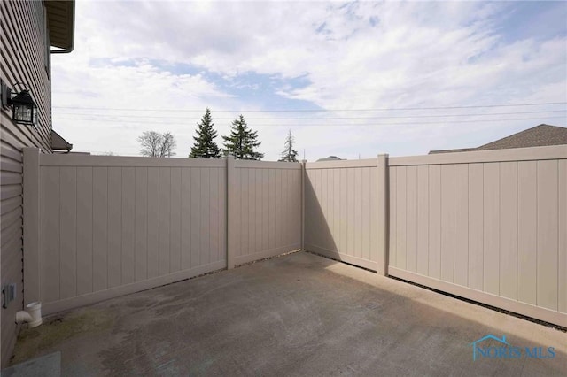 view of patio with fence