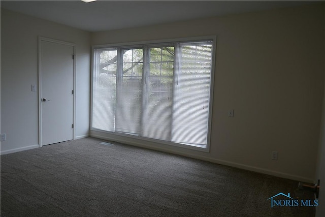 6553 Abbey Run Unit D13, Sylvania, OH 43560 - carpeted empty room with baseboards