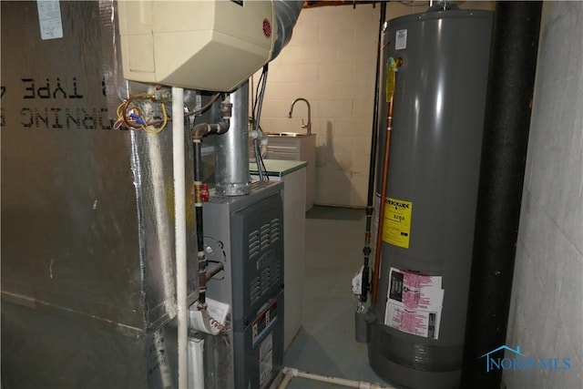 utility room featuring gas water heater