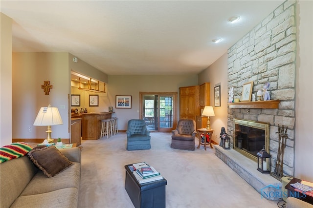 carpeted living area featuring a fireplace