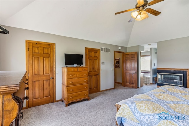 bedroom featuring high vaulted ceiling, carpet, a ceiling fan, baseboards, and visible vents