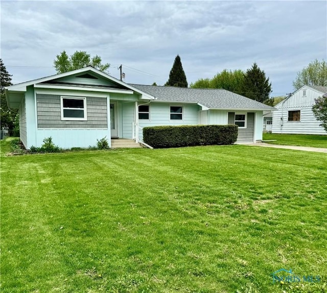 312 Minneapolis St, Defiance, OH 43512 - ranch-style home featuring a front yard