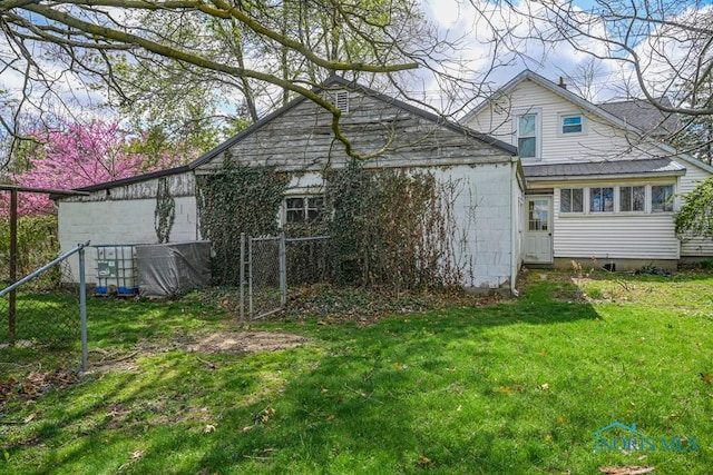 exterior space featuring a yard and fence