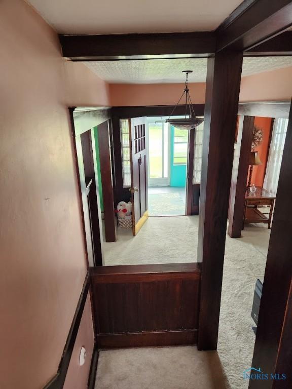 602 W Main St, Fayette, OH 43521 - hall with carpet floors and beam ceiling