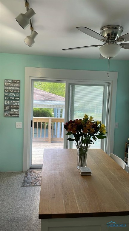 602 W Main St, Fayette, OH 43521 - dining room featuring a ceiling fan and carpet flooring