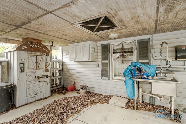 interior space with a sink and covered porch