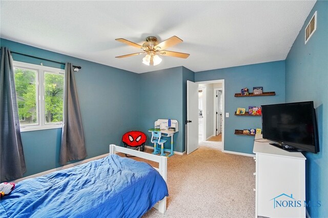 2369 Saint James Woods Blvd, Toledo, OH 43617 - bedroom featuring baseboards, carpet, and ceiling fan