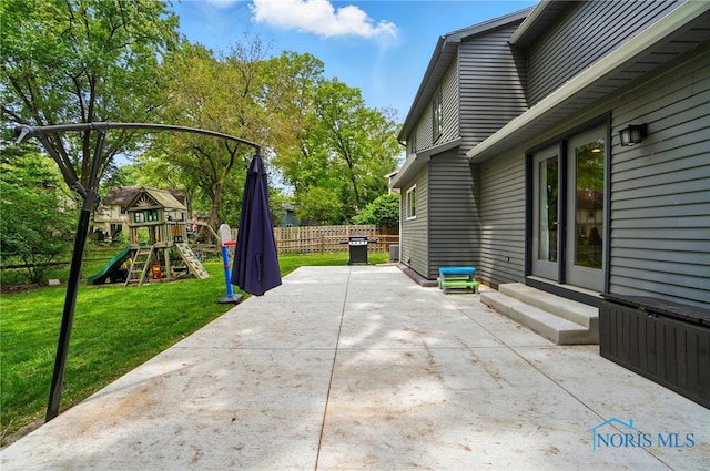 2369 Saint James Woods Blvd, Toledo, OH 43617 - view of patio / terrace featuring entry steps and a playground