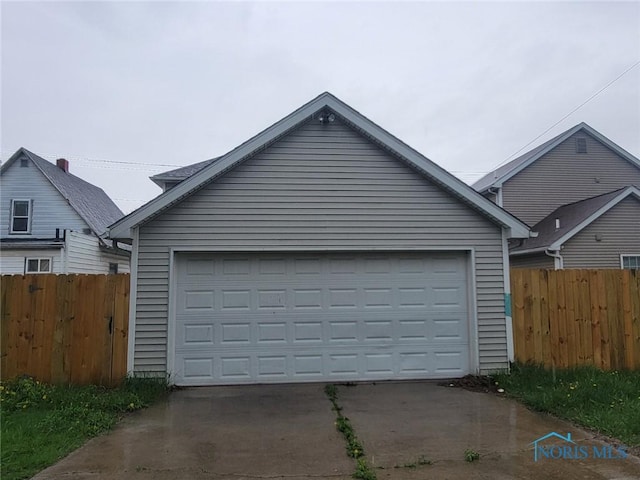 garage featuring fence