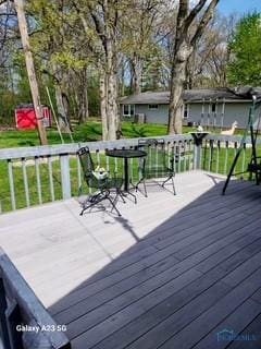 1805 Ayersville Ave, Defiance, OH 43512 - wooden terrace with a lawn