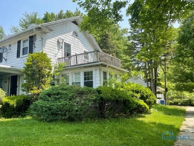 2004 Calumet Ave, Toledo, OH 43607 - view of home's exterior featuring a balcony