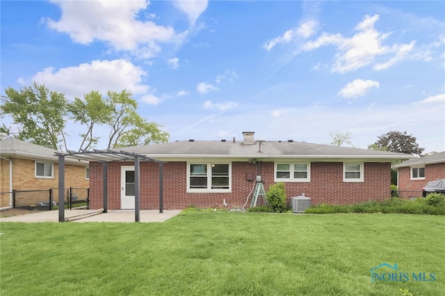 1137 Rosedale St, Maumee, OH 43537 - back of property featuring a pergola, a patio, and brick siding