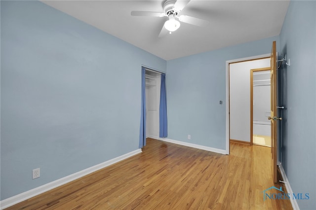 1137 Rosedale St, Maumee, OH 43537 - unfurnished bedroom with light wood-style flooring, baseboards, a closet, and a ceiling fan