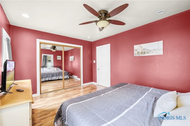 4835 291st St, Toledo, OH 43611 - bedroom with light wood-type flooring, ceiling fan, baseboards, a closet, and recessed lighting