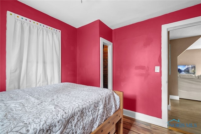 4835 291st St, Toledo, OH 43611 - bedroom with wood finished floors and baseboards