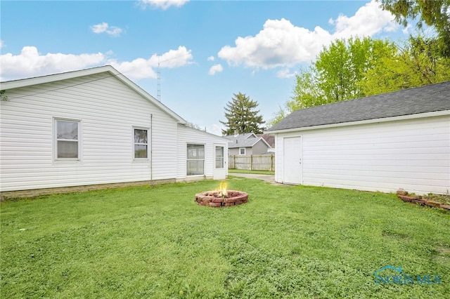 4835 291st St, Toledo, OH 43611 - view of yard featuring a fire pit
