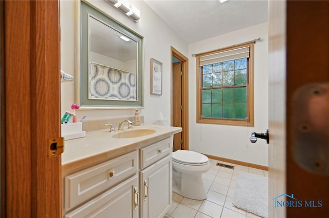 full bathroom with a textured ceiling, visible vents, tile patterned floors, vanity, and toilet