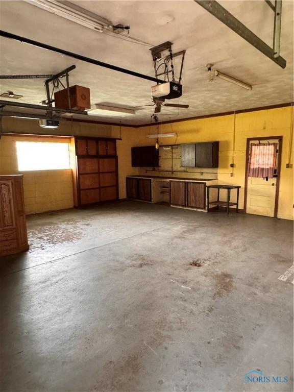 980 E Riverview Ave, Napoleon, OH 43545 - garage featuring a garage door opener