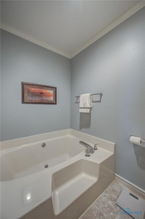 bathroom featuring crown molding, baseboards, and a garden tub