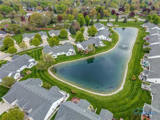 bird's eye view with a water view and a residential view