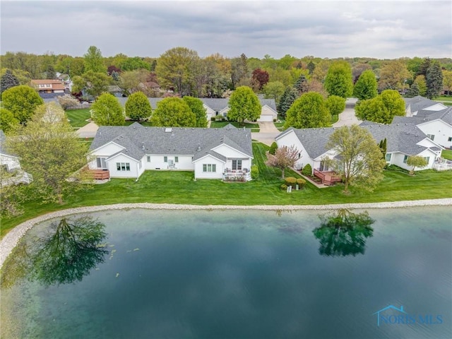 aerial view featuring a water view and a residential view