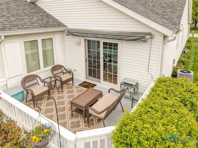 exterior space featuring central AC unit