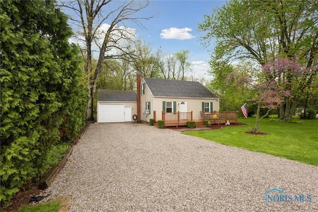 22020 Switzer Rd, Defiance, OH 43512 - view of front of property featuring driveway, a wooden deck, a chimney, a front lawn, and an attached garage